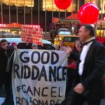 Protesters confront one of the gala attendees, who shouts back at them (Gothamist)